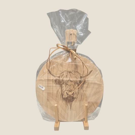 Gegraveerde borrelplank met een hooglander