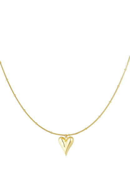 Goudkleurige bolletjes ketting met iconisch hart, gemaakt van stainless steel, duurzaam en stijlvol.